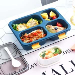Multi-compartment dark blue lunch box with yellow buckles and separate soup container