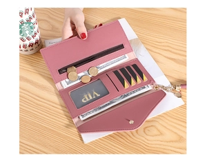 Detailed interior of rose pink tri-fold wallet showing card slots and zipper pocket