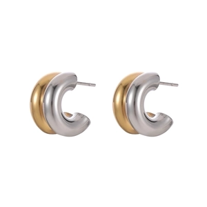 Two-tone gold and silver C-shaped chunky hoop earrings with a polished metallic finish