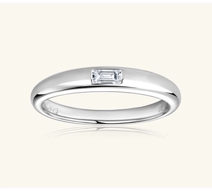 Macro detail of S925 sterling silver ring with a rectangular Moissanite stone inlay