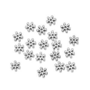 Seventeen 7mm silver snowflake spacer beads for DIY jewelry and bracelet making