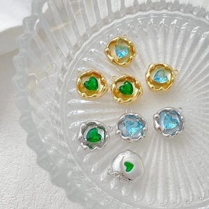 14k gold plated heart pendants with colorful zircon in glass bowl for DIY jewelry