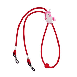 Detail of red elastic glasses strap with a cute 3D unicorn silicone accessory for kids
