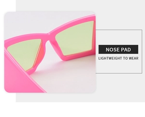 Détail des plaquettes de nez ergonomiques sur lunettes de soleil papillon surdimensionnées