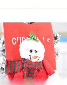Detail of red felt Christmas bag with 3D snowman and Merry Christmas lettering