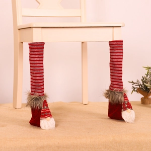 Christmas gnome chair leg covers with red stripes and plush trim for festive dining decor