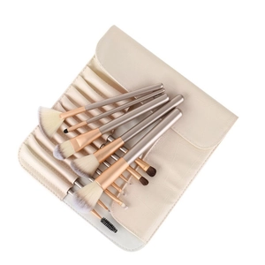 Champagne gold makeup brushes set with dual-tone bristles and beige PU leather roll-up bag