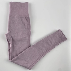 Close-up of seamless knitted yoga pants with high-waist ribbed band in light lavender hue