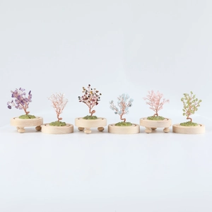 Set of six mini crystal trees with amethyst and rose quartz on wooden bases for desk decor
