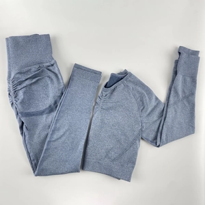 Detail of heather blue seamless yoga set with high waist scrunch leggings and thumbhole top