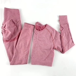 Detail of pink-purple seamless yoga set with long sleeve crop top and leggings