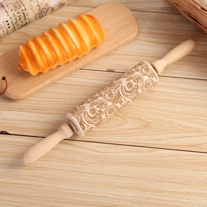 Floral and paisley embossed wooden rolling pin for Christmas cookie patterns