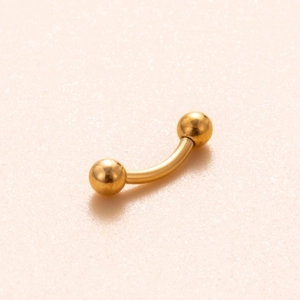 Titanium G23 curved barbell piercing in gold finish with two spherical bead ends