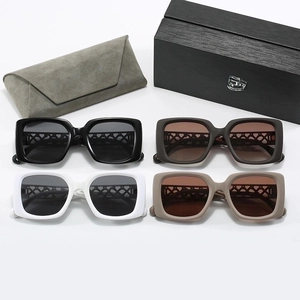 Detailed set of four rectangular sunglasses with woven temples and gift packaging box