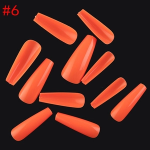 Glossy long coffin-style orange press-on nails set of 10 pieces on a black background