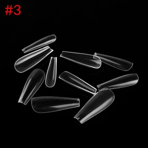 Detailed view of clear coffin-shaped press-on nails showing size numbers and ABS material