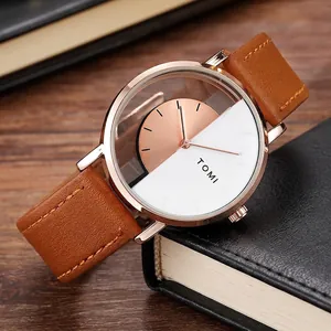 Minimalist unisex skeleton watch with brown leather strap and rose gold hollow dial