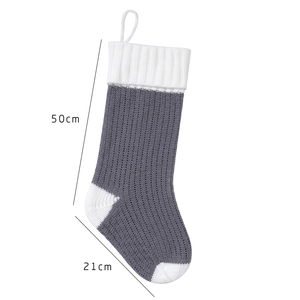 Detail showing dimensions of the 50cm grey and white knitted Christmas gift stocking