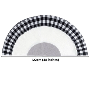 Detail showing the 122cm 48 inch diameter of the knitted black and white plaid tree skirt