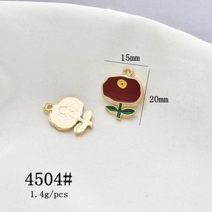 Detailed view of red tulip flower alloy pendants with 15mm by 20mm dimensions