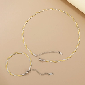 Detailed view of two-tone braided snake chain set with adjustable lobster clasp