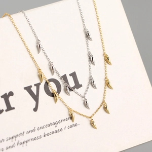 Minimalist S925 sterling silver chain necklace with polished chili horn pendants in gold and silver