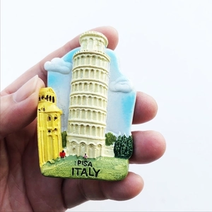 Detail of hand-held 3D resin Italy Pisa fridge magnet with relief PISA ITALY lettering