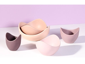 Detail view of colorful ceramic lotus bowls in Morandi tones with matte finish