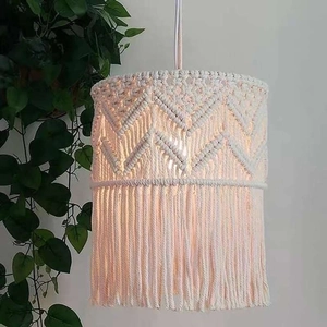 Handmade macrame lamp shade with bohemian fringe for cozy home bedroom wall decor