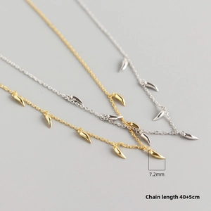 Detail view of S925 silver necklace showing 7.2mm spike charms and 40cm adjustable chain