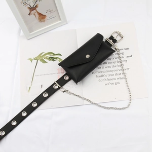 Detail view of a black punk waist bag with adjustable belt and silver metal chain