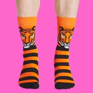Mid-calf cotton socks with orange and black stripes featuring a tiger jacquard pattern