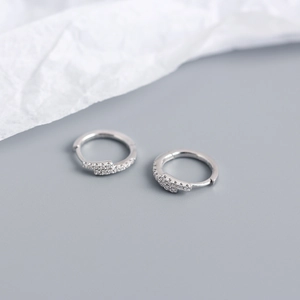 Close-up of S925 sterling silver hoop earrings with micro-set zircon stones