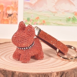 Sparkly red French Bulldog keychain with rhinestone strap and gold-tone metal ring