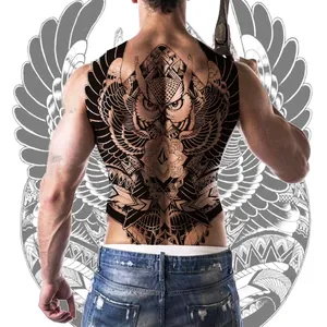 Full back temporary tattoo featuring a black mechanical owl design with tribal patterns