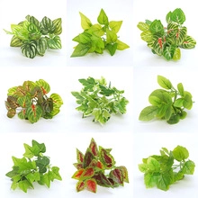 Collection of nine various artificial hanging green leaf styles for wedding decor