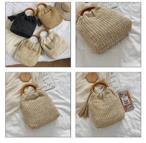 Flat lay detail of straw handbags with circular wooden handles in black, tan and beige