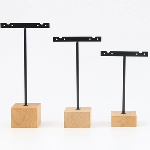 Set of 3 minimalist black metal T-bar earring display stands with solid wood bases