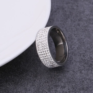 Polished stainless steel ring with five rows of sparkling white zircon crystals