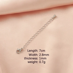 Macro detail of 7cm silver stainless steel extender chain with lobster clasp and dimensions