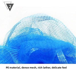 Close-up of the dense mesh texture and soft PE material of the large blue bath sponge ball