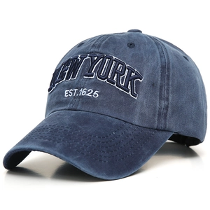 Vintage navy blue washed cotton baseball cap with New York embroidery in 45-degree view