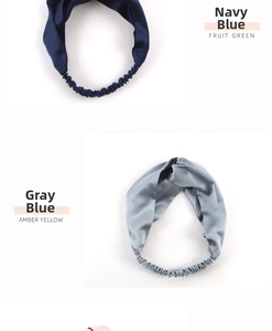 Detailed close-up of navy and grey-blue silk knot headbands with elastic back