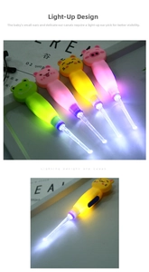 Close-up of animal-shaped LED earwax cleaners with glowing heads for baby care