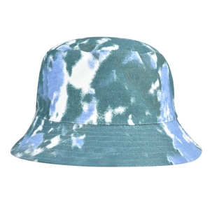 Close-up of tie-dye bucket hat showing blue and green cotton twill fabric texture