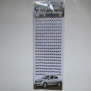 Macro detail of 3mm silver acrylic rhinestone stickers for DIY car and craft decoration