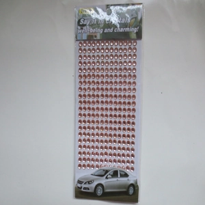 Detail of champagne gold acrylic crystal stickers with silver car decoration usage