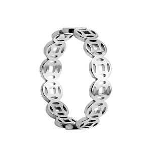Detailed macro shot of vintage silver steel ring with traditional Chinese coin pattern
