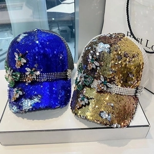 Sparkly sequin baseball cap with rhinestone bee and breathable mesh, two colors displayed
