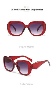 Detail view of large square red sunglasses with polygon temples and gradient grey lenses